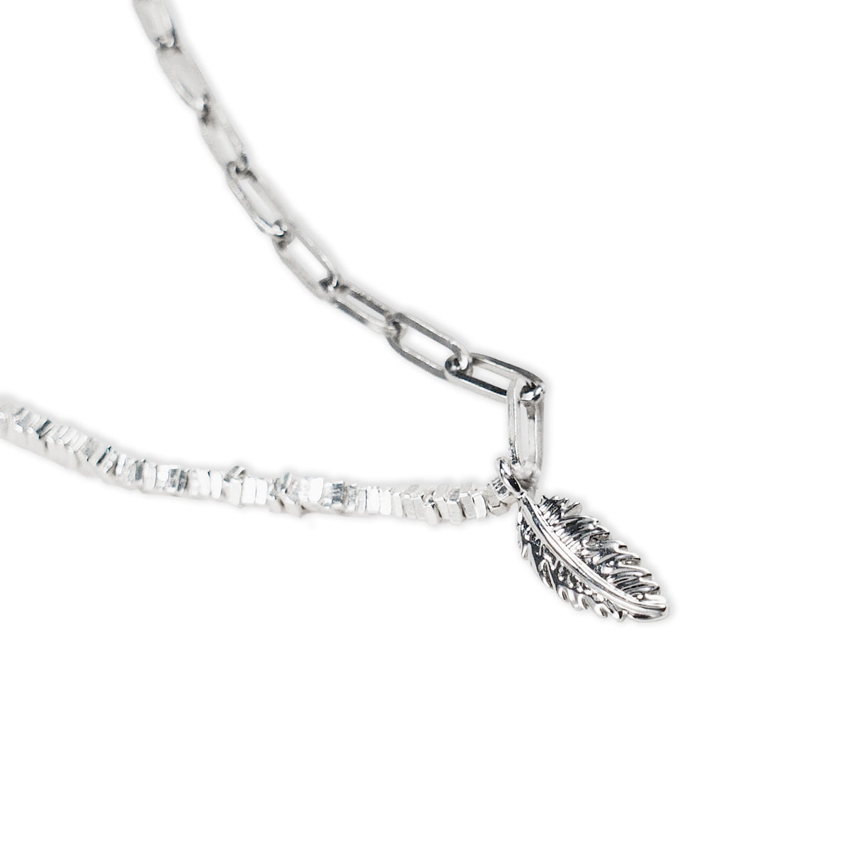 Silver bracelet with a feather charm on a white background