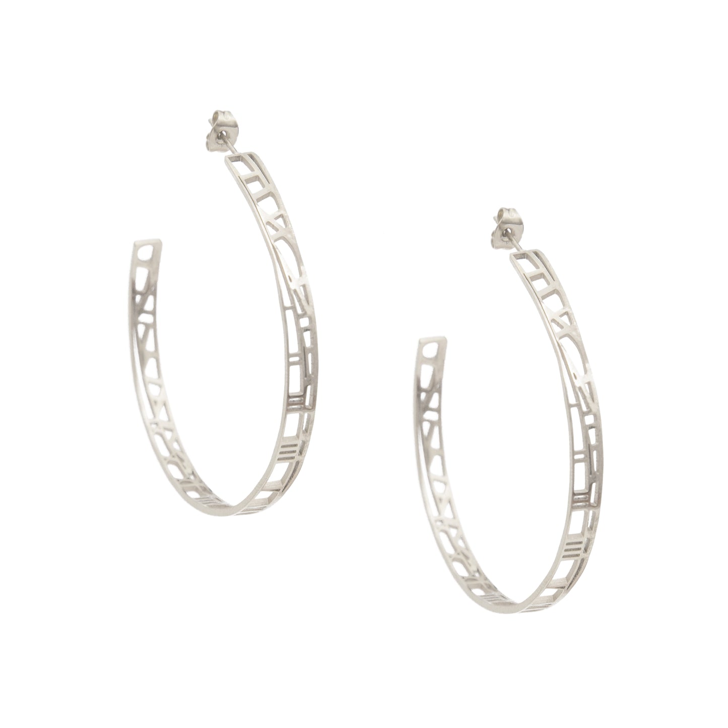Silver hoop earrings with a geometric design on a white background