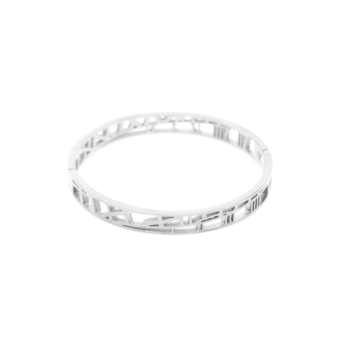 Silver bracelet with intricate design on a white background