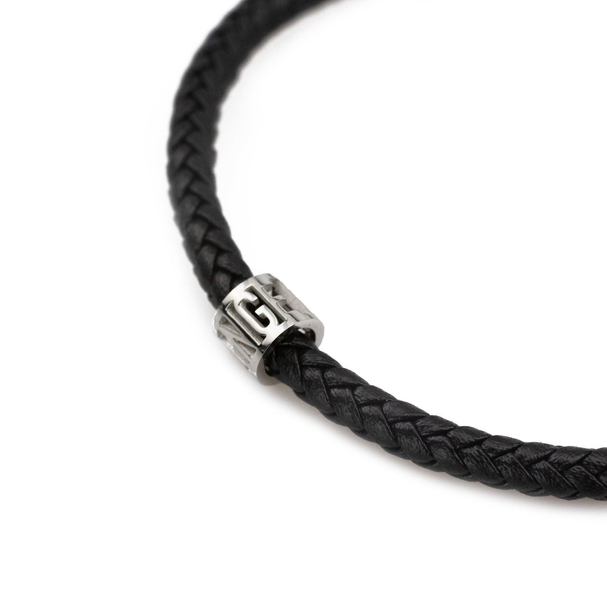 Black braided cord bracelet with a silver clasp on a white background
