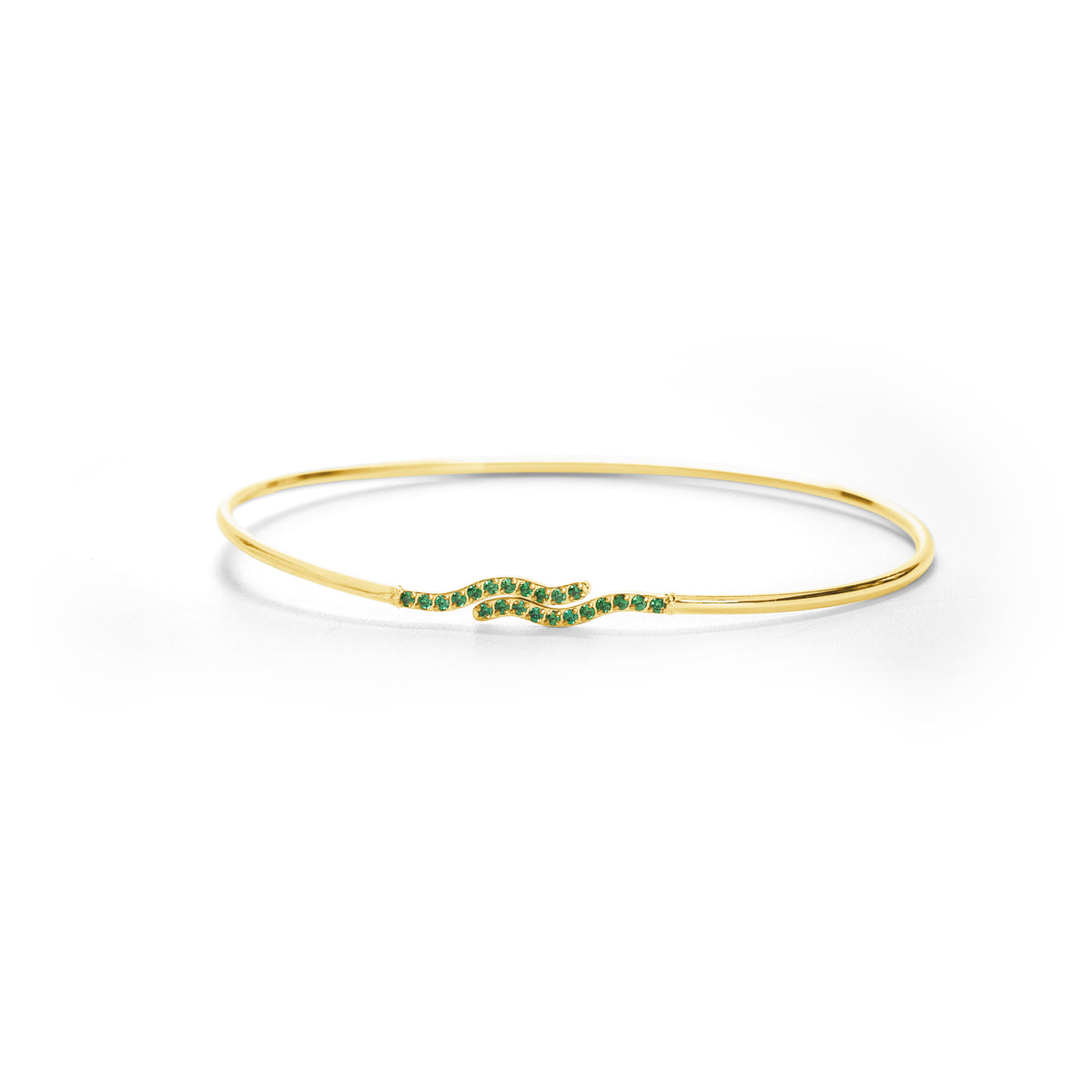 Gold bracelet with green gemstones on a white background