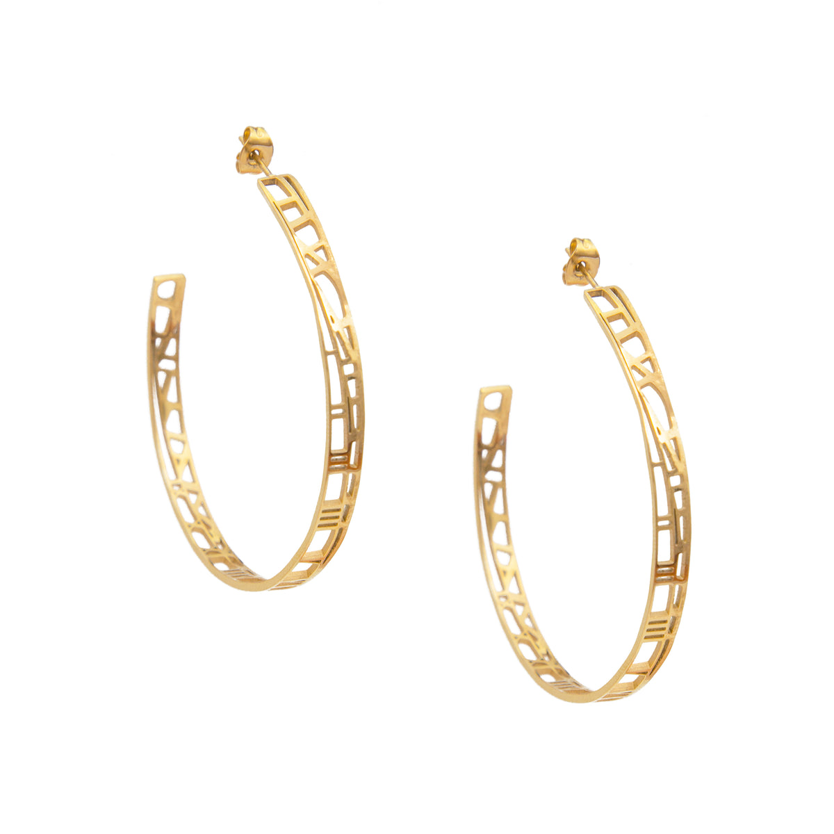 Gold hoop earrings on a white background