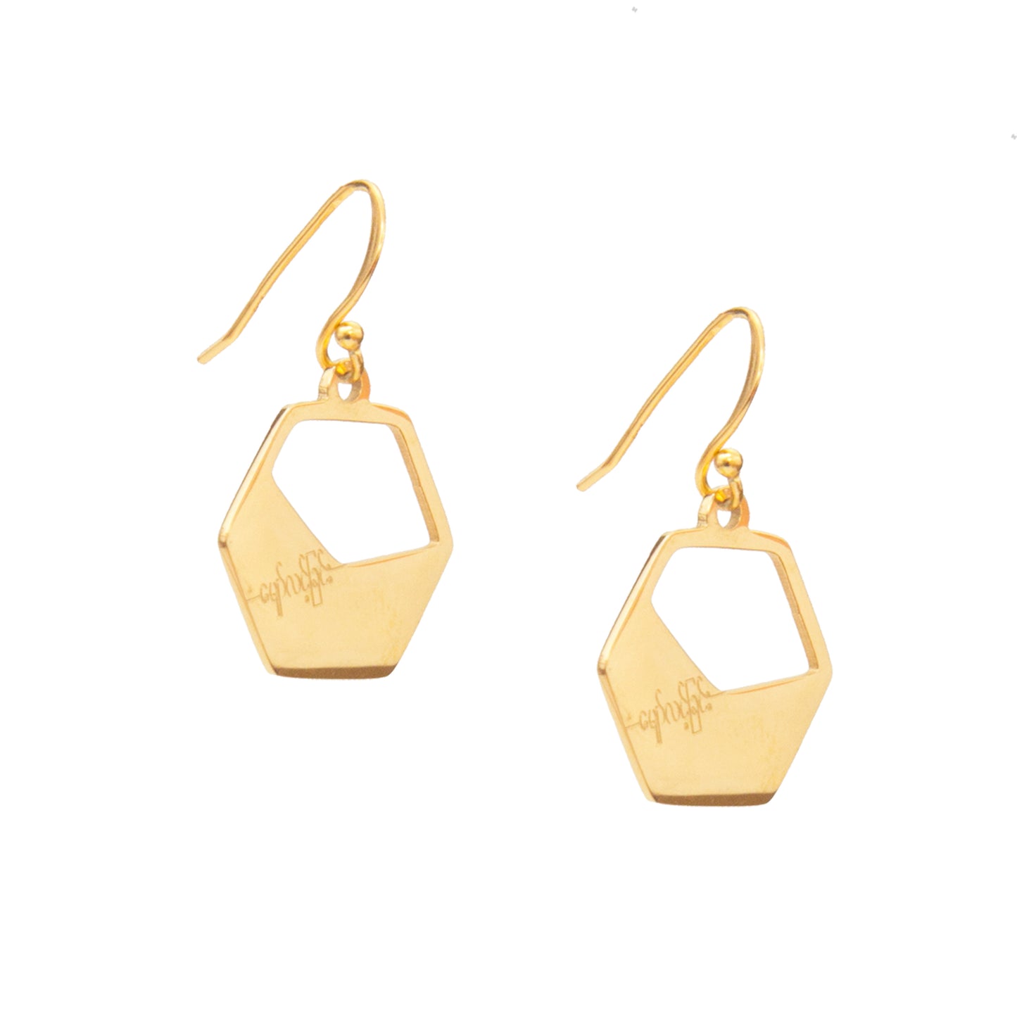 Gold geometric earrings on a white background