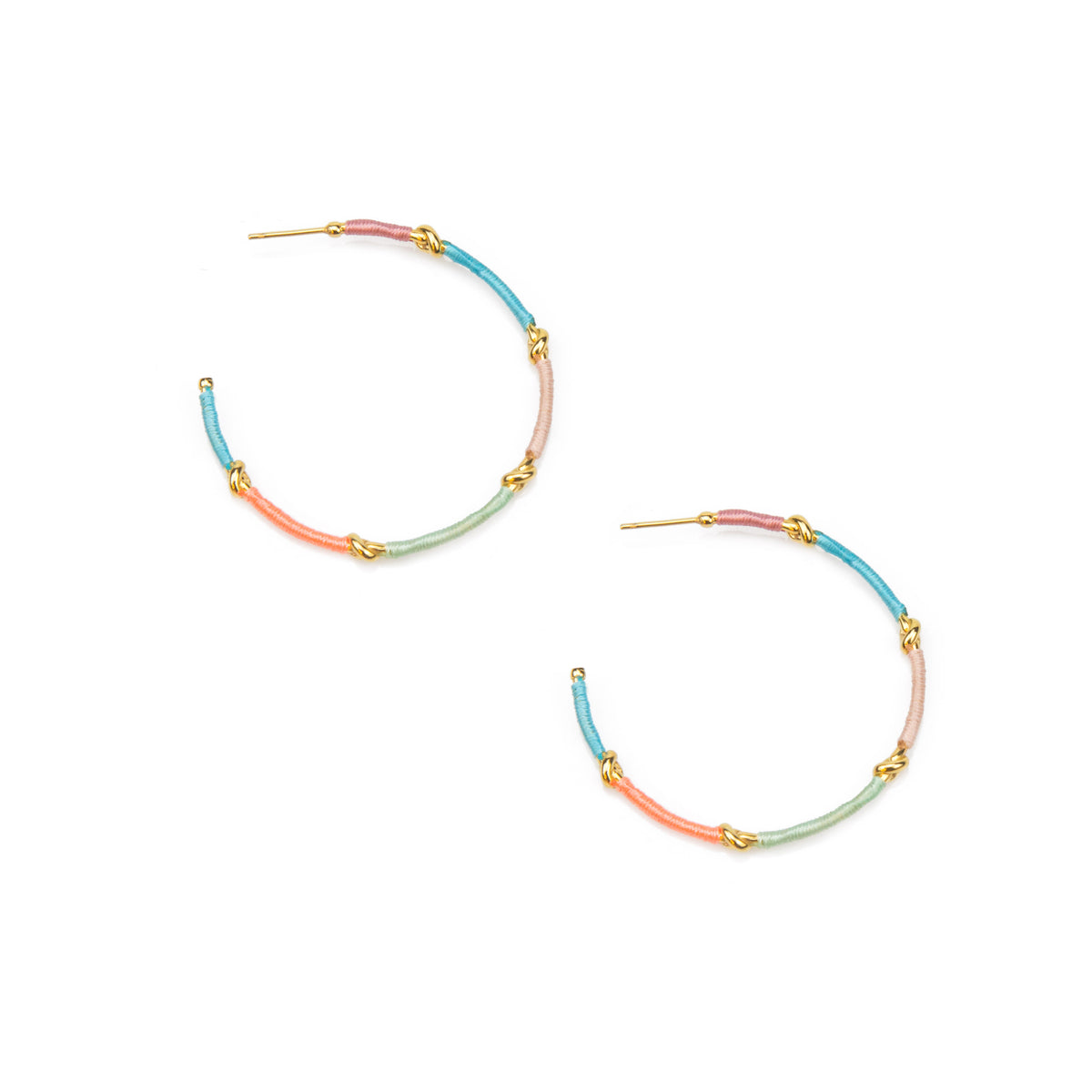 Pair of colorful hoop earrings on a white background