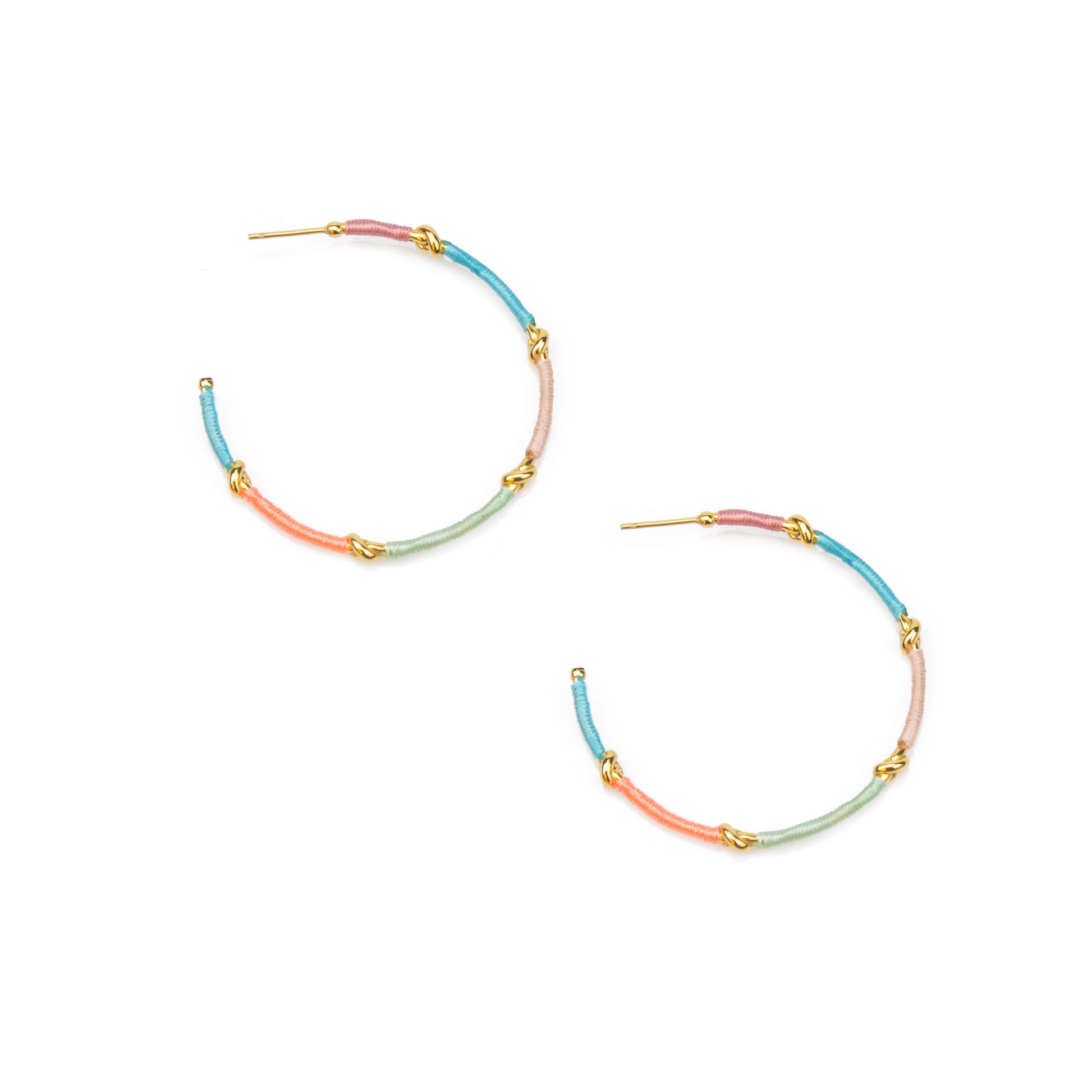 Pair of colorful hoop earrings on a white background