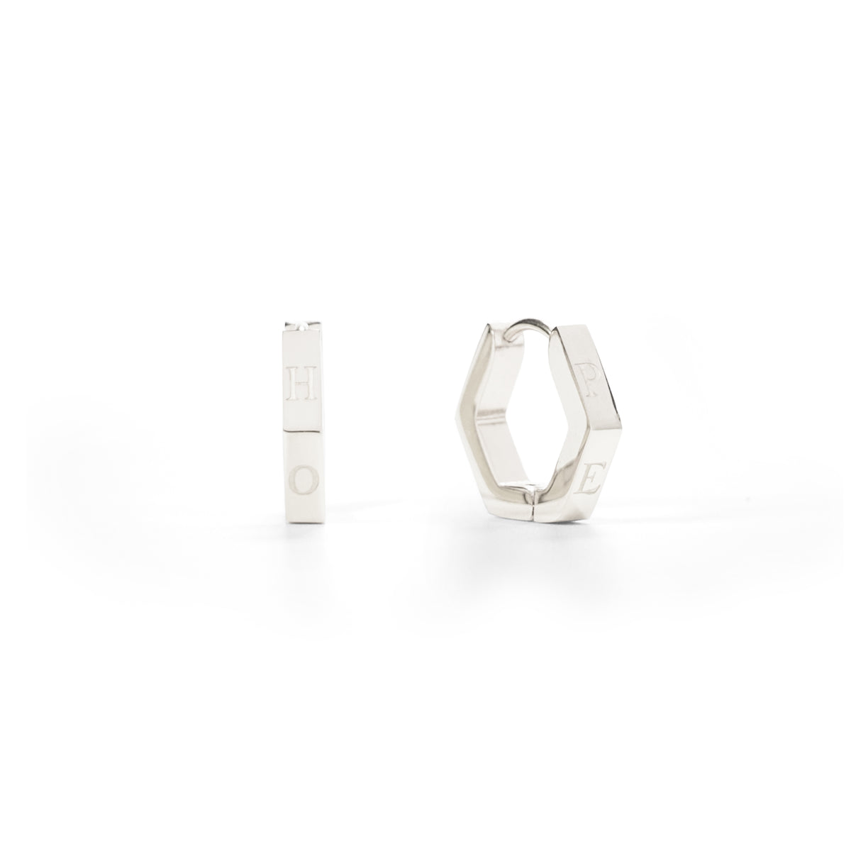 Silver hoop earrings on a white background