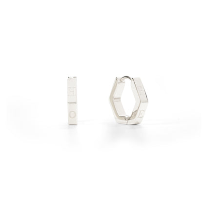 Silver hoop earrings on a white background