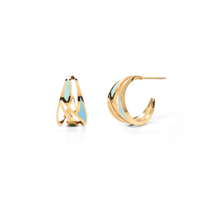 Gold hoop earrings with blue accents on a white background