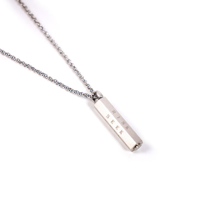 Silver necklace with a bar pendant on a white background