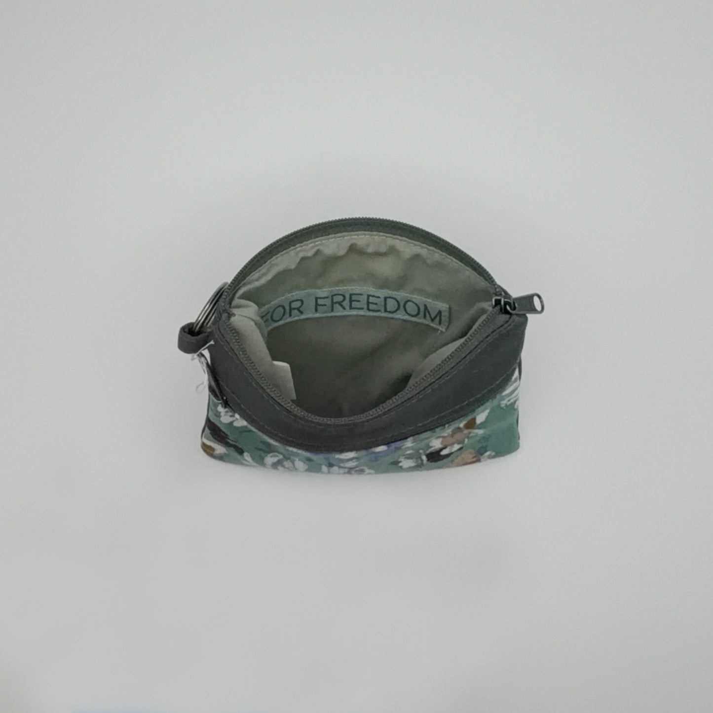 Small pouch with floral pattern on a white background