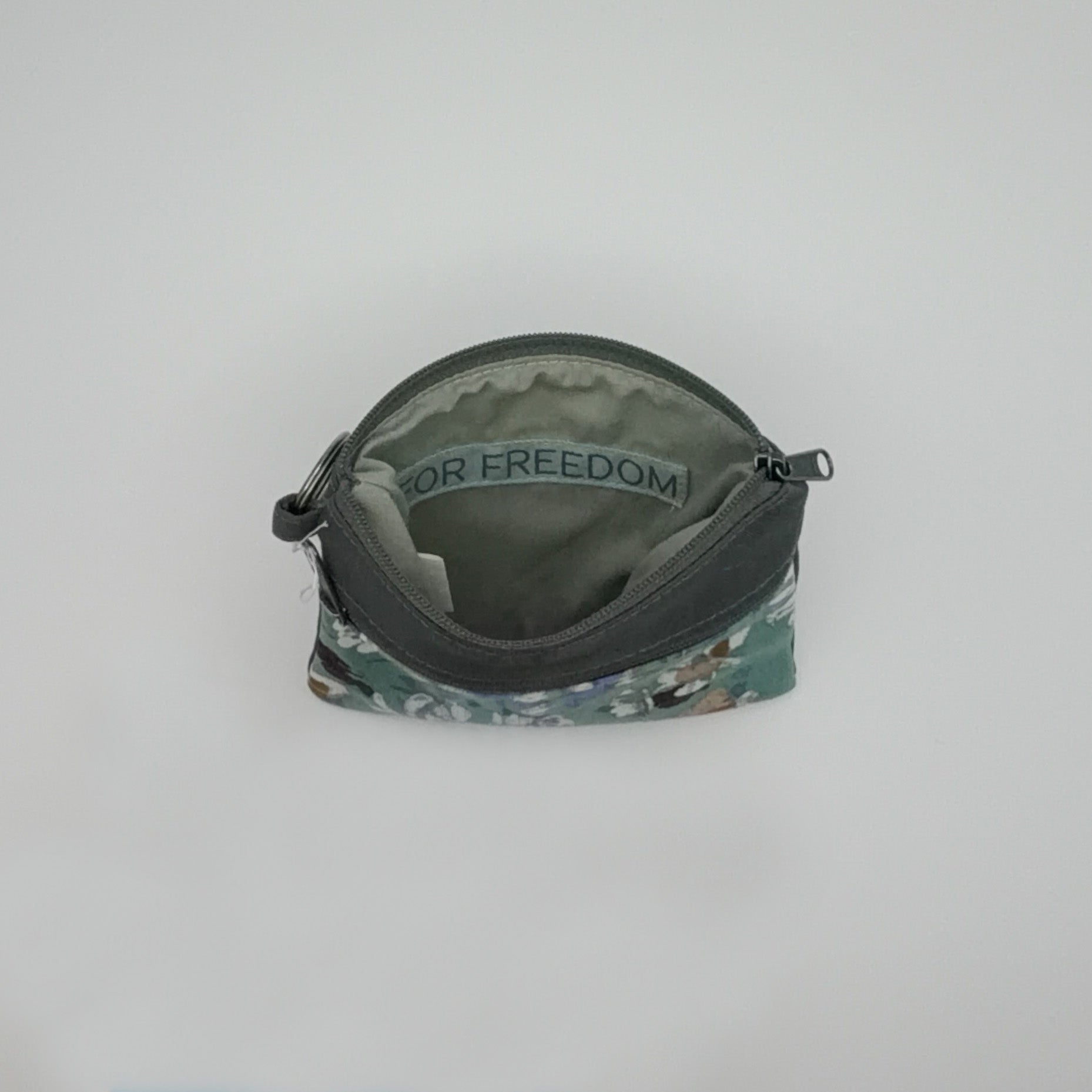 Small pouch with floral pattern on a white background