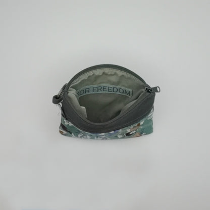Small pouch with floral pattern on a white background