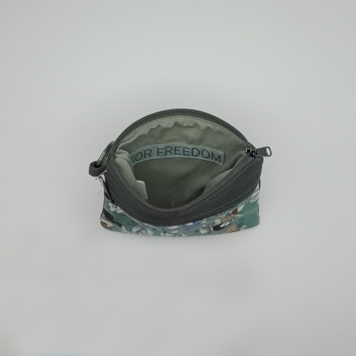 Small pouch with floral pattern on a white background