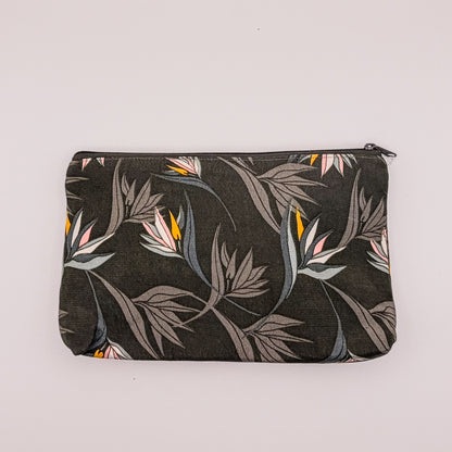 Floral-patterned pouch on a light gray background