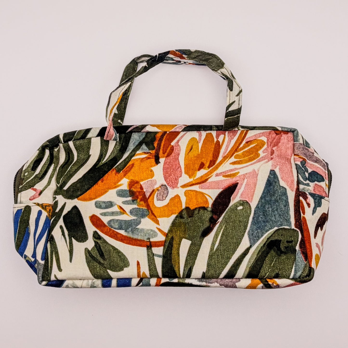 Floral patterned bag on a light gray background